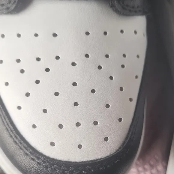 Air Jordan Black and White High-Top Sneakers