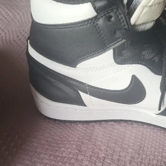Air Jordan Black and White High-Top Sneakers