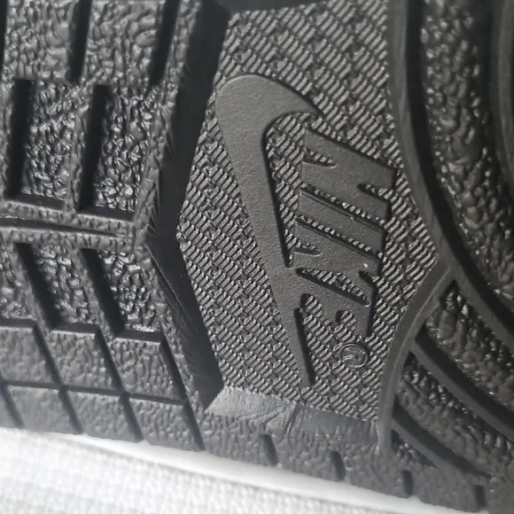 Air Jordan Black and White High-Top Sneakers