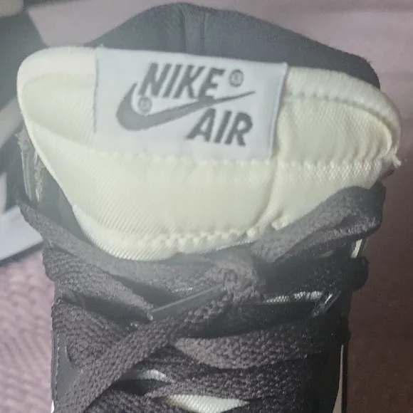 Air Jordan Black and White High-Top Sneakers