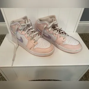 Air Jordan girl’s high top sneakers