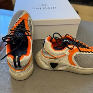 Authentic Balmain Men's B Runner Asymmetric Chunky Sneakers.