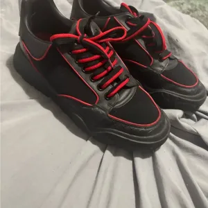 Black and Red Chunky Sneakers with Bold Accents