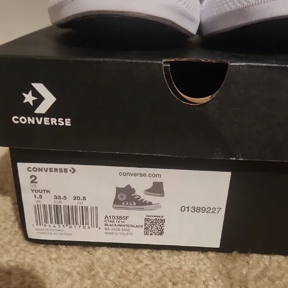 Converse Black High-Top Sneakers Unique Eye Design