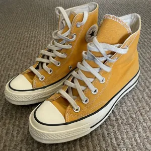 Converse High-Top Sneakers in Mustard Yellow