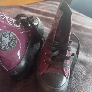 Converse Purple and Black High-Top Sneakers