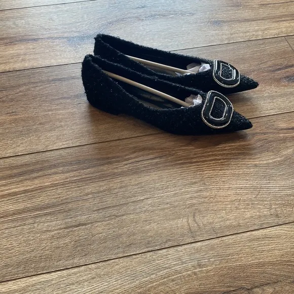 C.Paravano black ballet flats with pointed toe