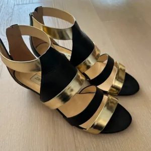 Jimmy Choo Black and Gold Sandals