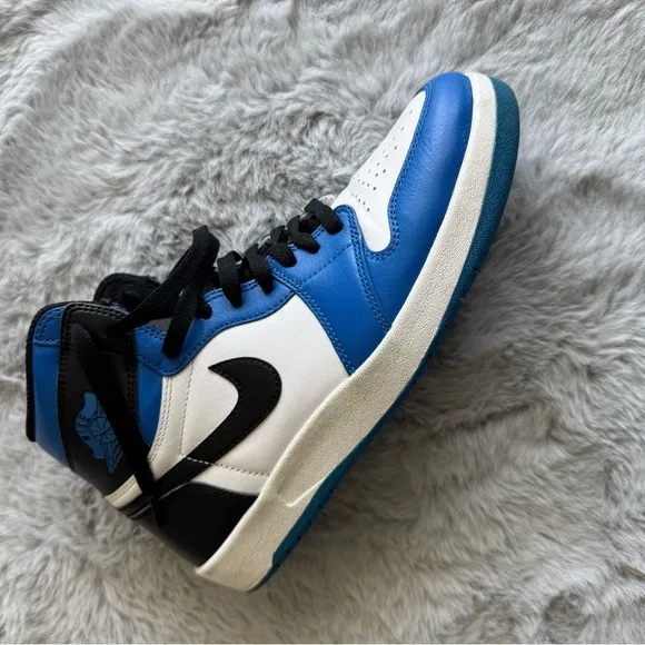 Jordan 1.5.    Nike Air Blue and White High-Top Sneakers
