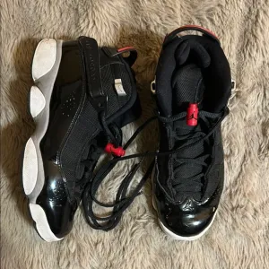 Jordan Black and Red Retro Sneakers with Cushioned Soles