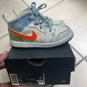 Jordan Blue and Orange Sneakers High-Top Design