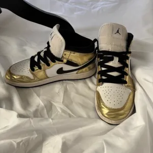 Jordan Gold and White Sneakers High-Top Design