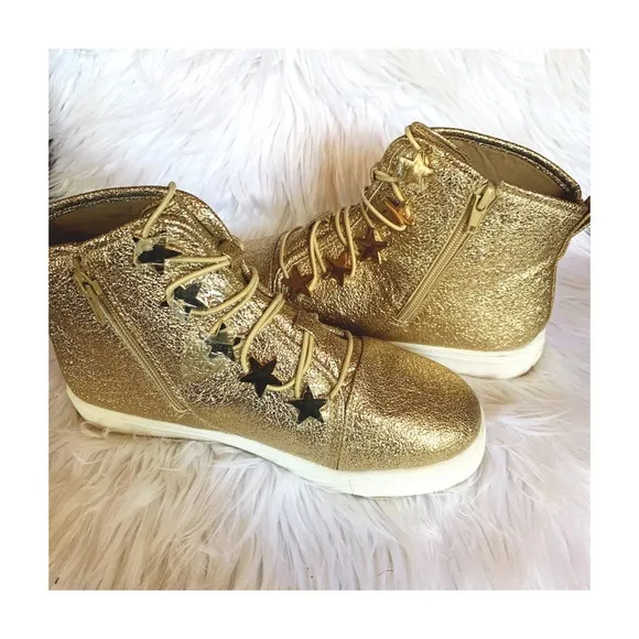 Katy Perry’s Astrea metallic high top sneakers