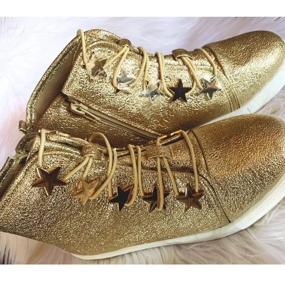 Katy Perry’s Astrea metallic high top sneakers