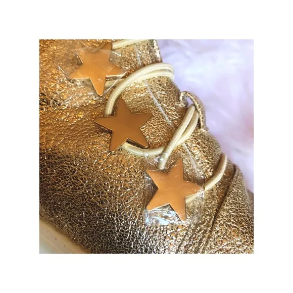 Katy Perry’s Astrea metallic high top sneakers