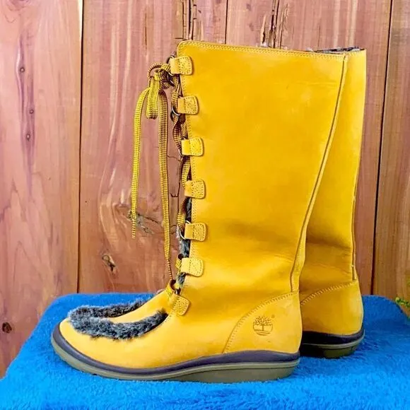Ladies Timberland insulated cold weather boots size 7M NWOT.