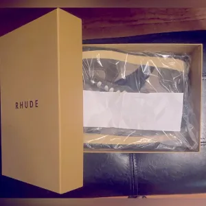 Men’s RHUDE high top sneakers size 13 with box never worn! Designer sneakers!