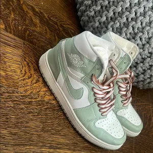 Mint Green and White High-Top Sneakers