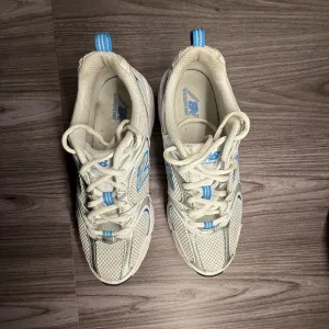 New Balance White and Blue Sneakers Comfortable Athletic Design