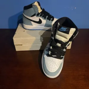 Nike Blue and Black Sneakers High-Top Design