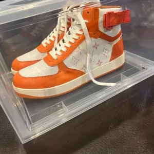 Orange and White High-Top Sneakers
