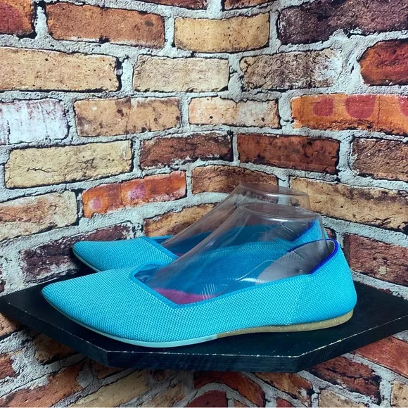 Rothy’s pointed blue flats