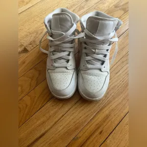 Women’s White High-Top Sneakers